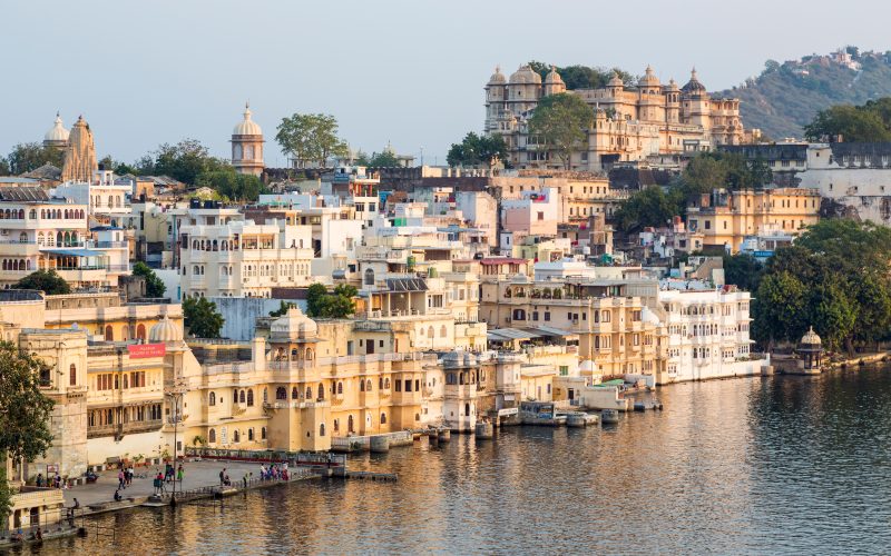 Where to travel in March. Lake Pichola and the City Palace in Udaipur, Rajasthan, India