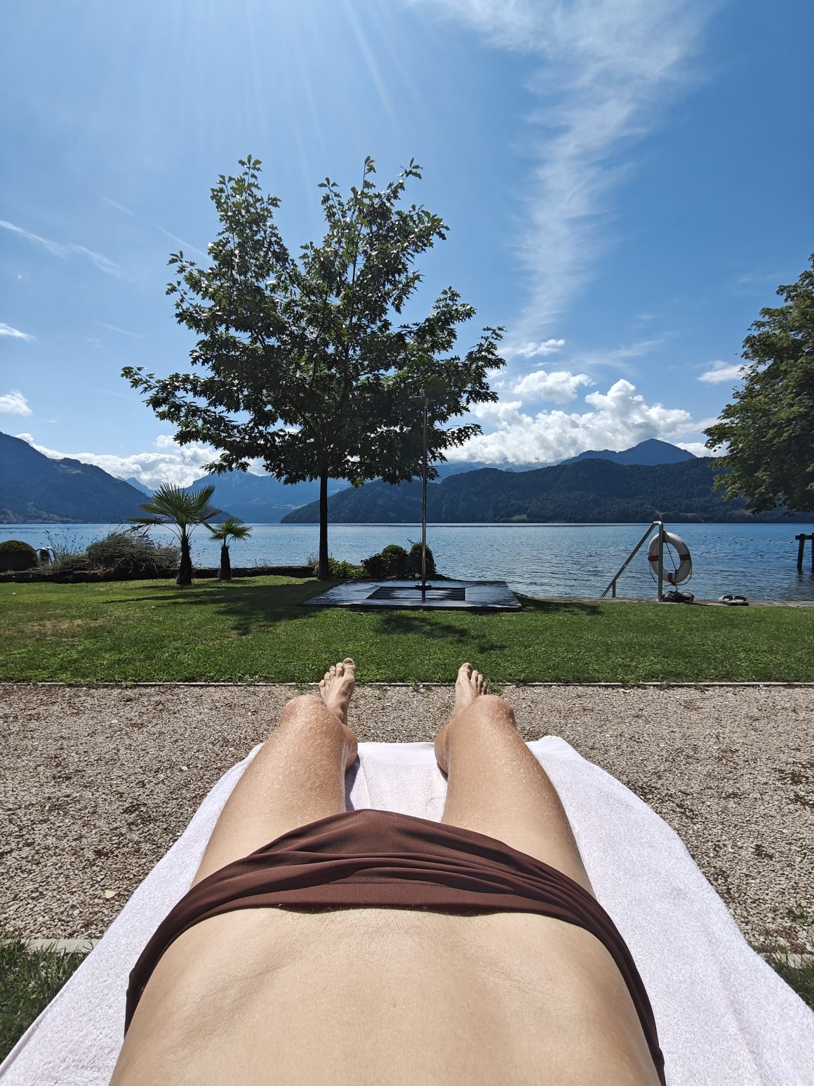 Me-sunbathing-by-Lake-Lucerne-at-Chenot-Palace