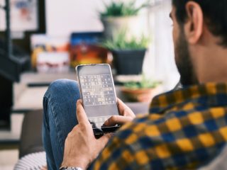 playing puzzle game on phone in usa