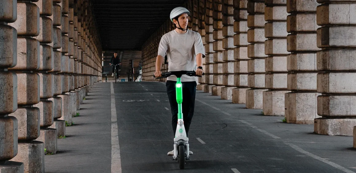 A guy on a Lime scooter