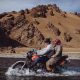 Crossing a river on a motorbike in Mongolia